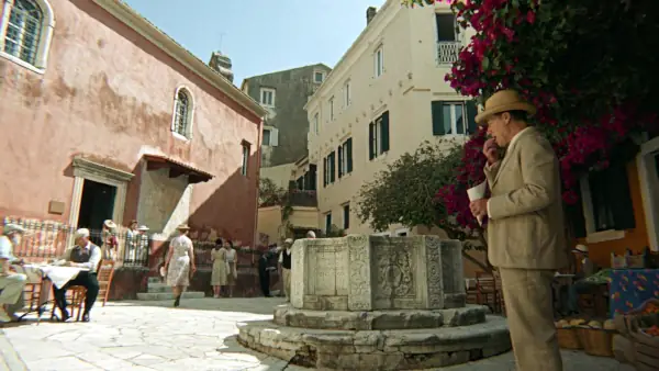Atticus Pünd eating cherries in Kremastis Square
