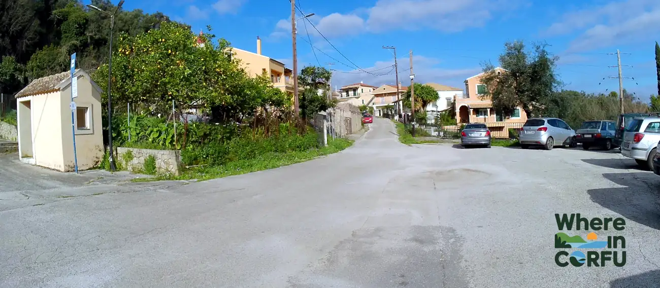Entrance to the village with Bus stop and Parking